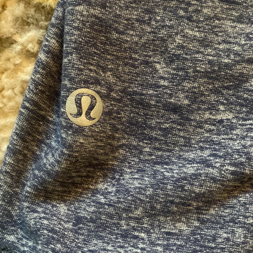 Lulu lemon , tight fit quarter zip up size 2.. not sold anymore i don’t think